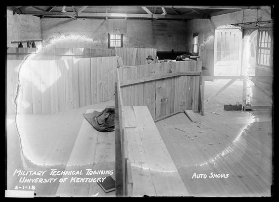 Possibly in armory, door with curved top to right of picture, notation Auto shops