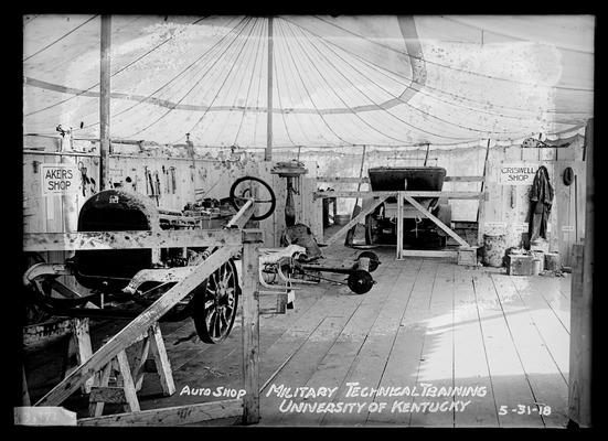 Tent with signs Akers Shop, Criswell Shop, notation Auto shop