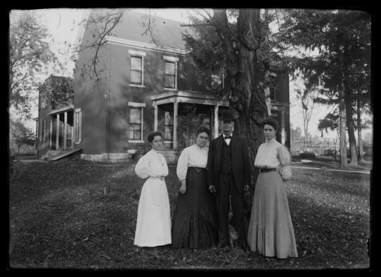 Bitterman family, in front of house