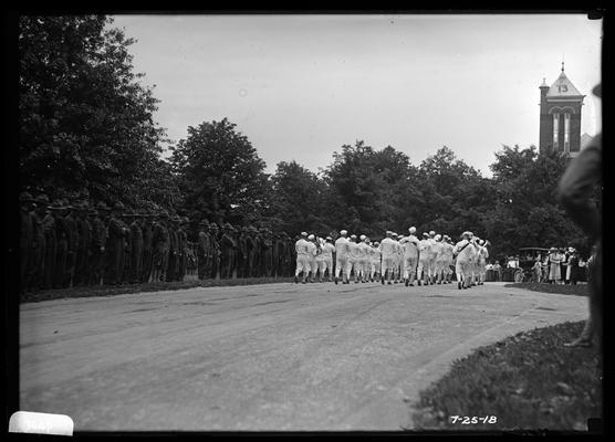 Navy band marching north on main drive, view looking north