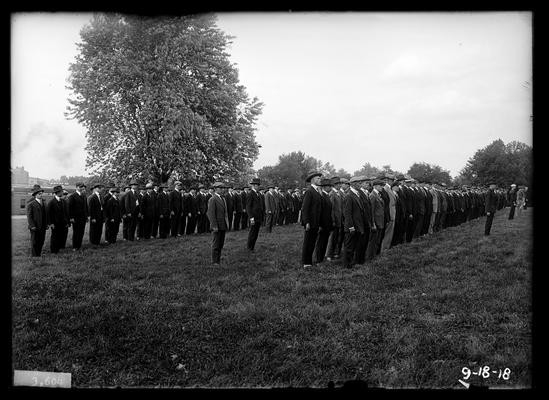Men in formation on campus
