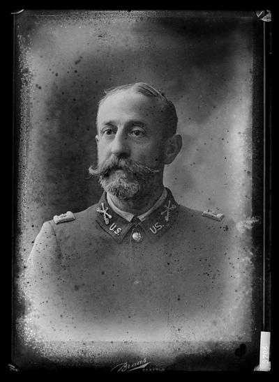 Portrait of man in uniform, beard, 3s on shoulder