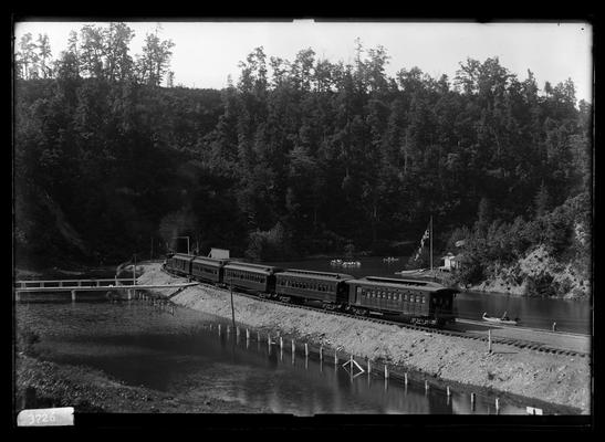 Mechanical engineer's excursion to Natural Bridge train with four coaches, boats on lake, Louisville and Eastern Railroad (Chesapeake and Ohio Railway)