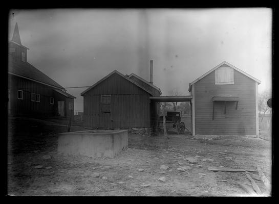 Concrete water tank and rear of barn