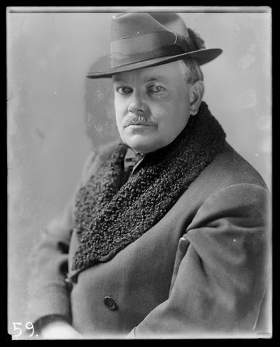 Dean F. Paul Anderson portrait, with hat