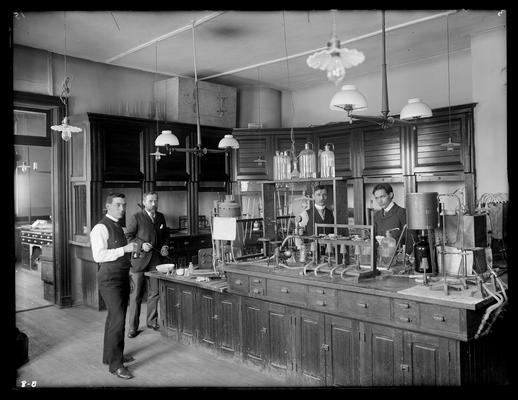 Entomology and Botany Laboratory, looks like chemistry laboratory with four different men