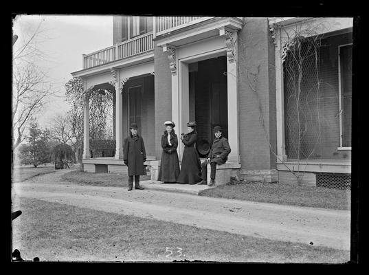 Director's (Scovell?) home, two men and two women