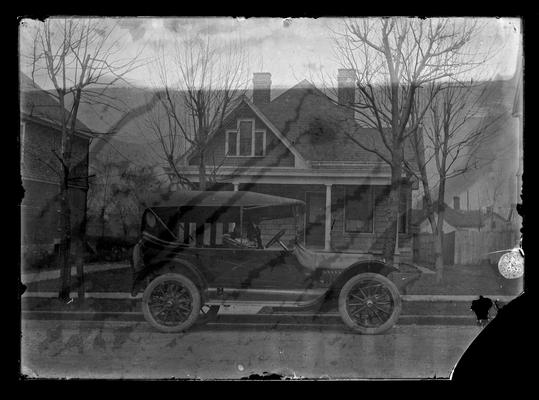 Car in front of house, child and boy
