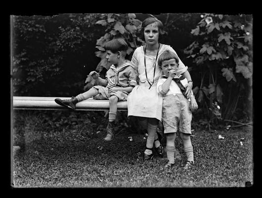 Young boy on stone bench