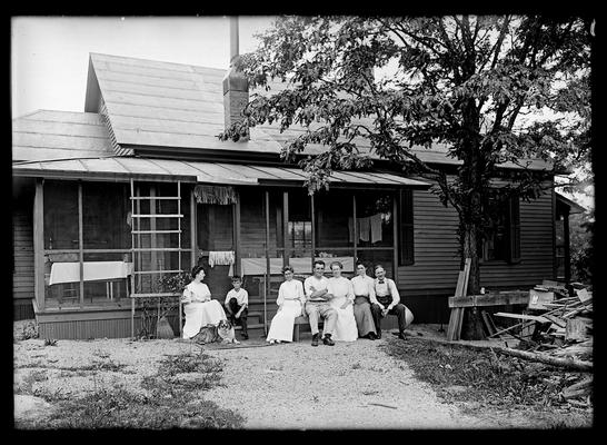 Family group at back of house