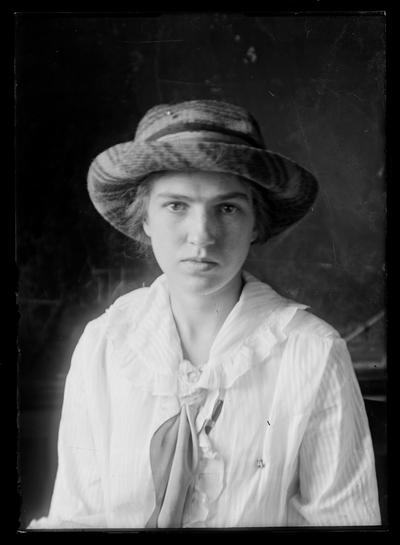 Young woman with hat on