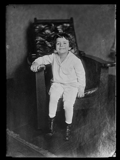 Boy in big chair