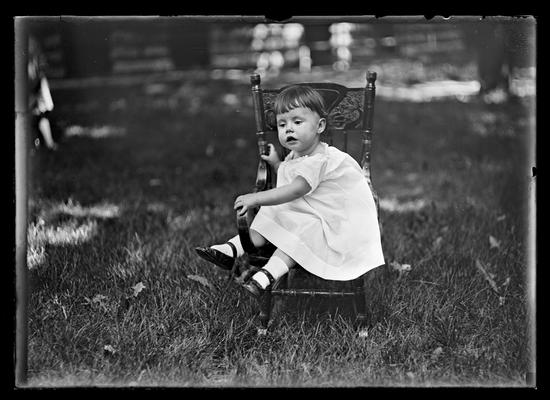 Baby in child's chair