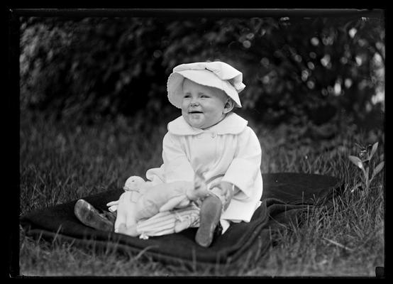 Baby in coat and bonnet, Professor Freeman