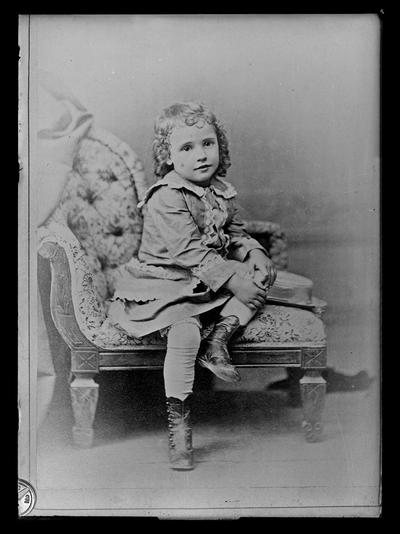 Child on chair, copy