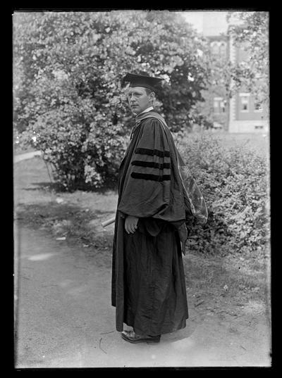 R.C. Stoll in robe and hood