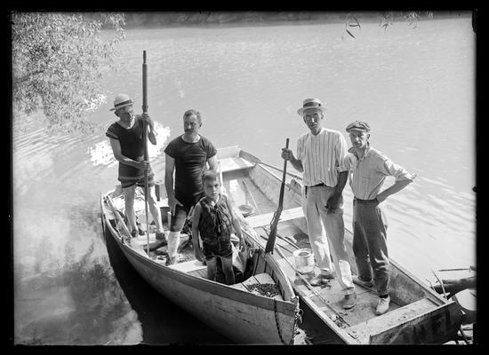 Hunting and fishing trip, two boats, four men, boy