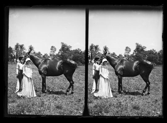 Horse, man, woman with cane