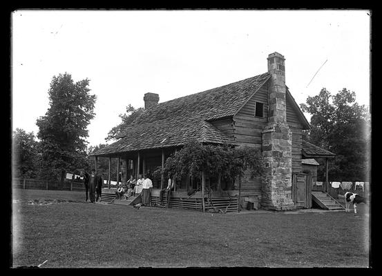 Farmhouse, family on porch