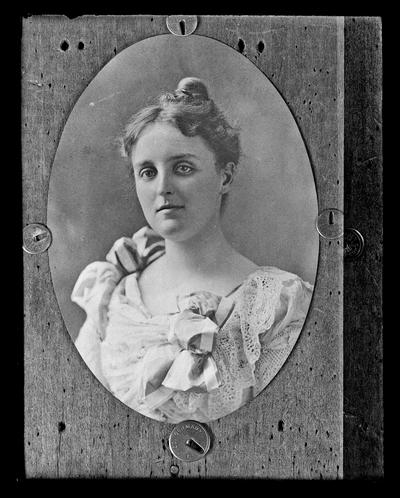 Copy, portrait of woman, hair on top of head