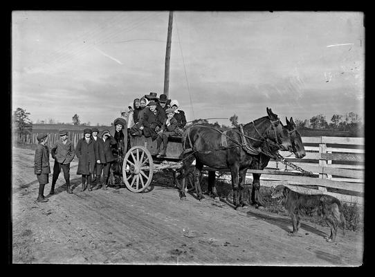 Greendale School (?), students and two adults, wagon, horses, dog