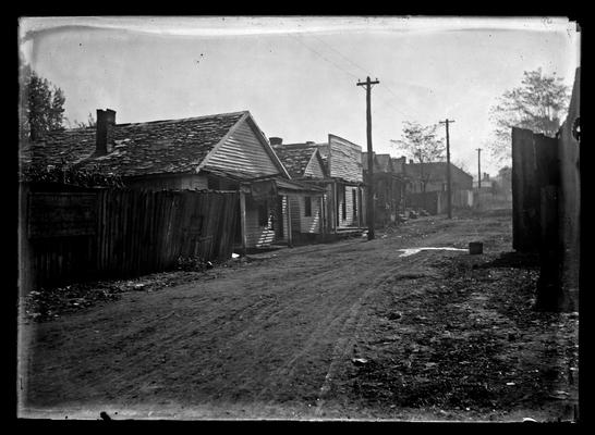 Lexington, City Engineers Office, Geo. (Geographic?) Land and Brothers on fence