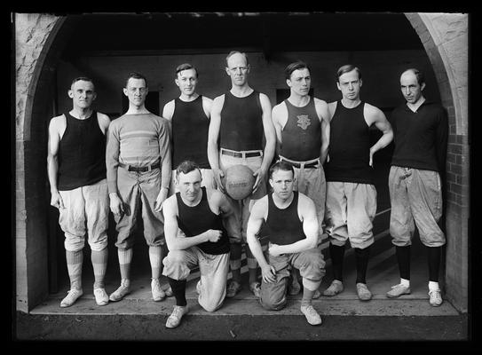 Faculty basketball team, H.H. Downing to left of J.J. Tigert, holding ball
