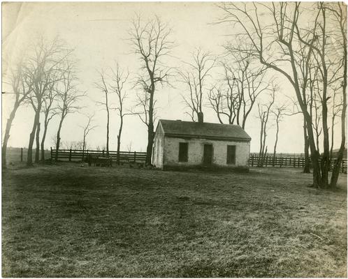 Exterior of old Greendale school house. Handwriting on verso. (Two copies)