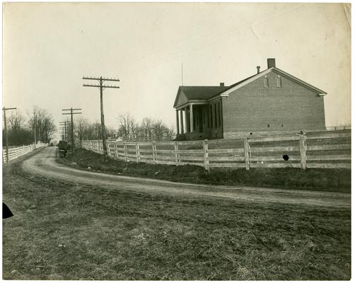 Exterior of new Greendale school house. Handwriting on verso. (Four copies)