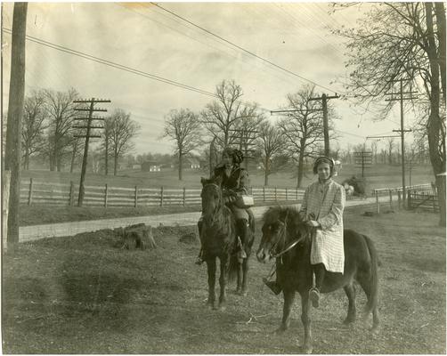 Two Greendale students on horseback