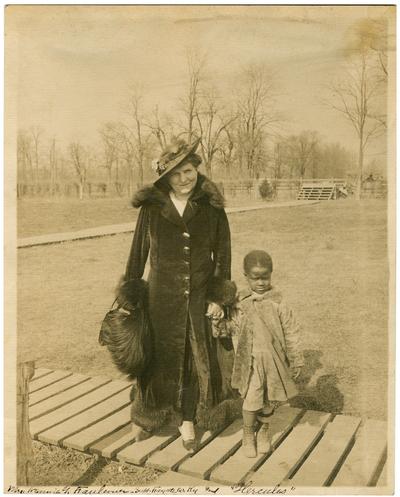 Portrait of Nannie Faulconer (1865?-1940) and Hercules, a Maddoxtown student