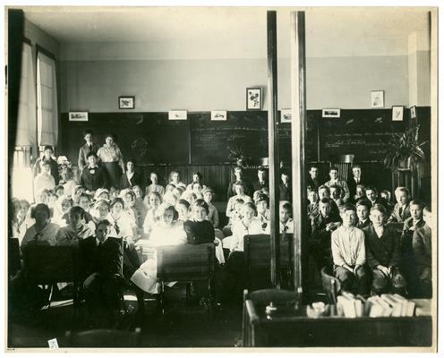 Picadome students seated at desks (view from back of room). Hand written on verso, Picadome.(Two copies)