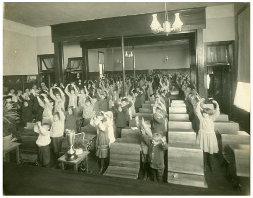 Picadome students in physical education class. Handwritten on verso, Picadome class in physical culture under Miss Margaret P. McCubbing Prin.(Three copies)