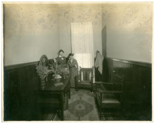 Portrait of Nannie Faulconer (1865?-1940) and Margaret McCubbing in the Picadome teacher's lounge. Handwritten on verso, 5 copies, Picadome
