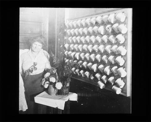 Mrs. Nannie Faulconer with display of soup cups