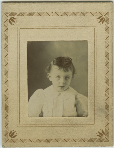 Unidentified child; found loose between pages twenty-six and twenty-seven of album
