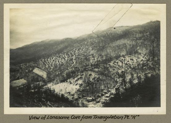 Title handwritten on photograph mounting: View of Lonesome Cove from Triangulation Point 'K'