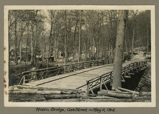 Title handwritten on photograph mounting: Rustic Bridge, Oak Street