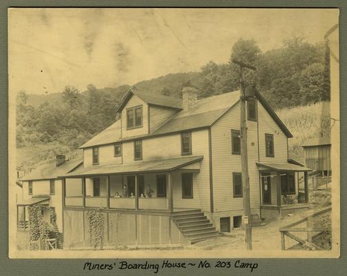 Title handwritten on photograph mounting: Miners' Boarding House at No. 203 Camp
