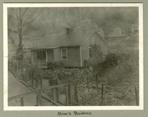 Title handwritten on photograph mounting: Miner's Residence