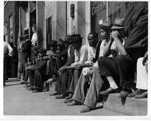 Spectators, black and white, at dedicatory ceremony