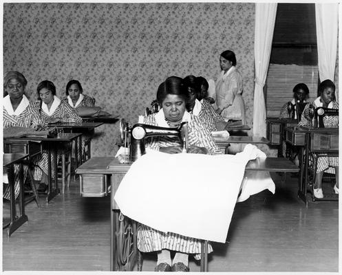 A representative number of colored women from relief rolls works in training work centers
