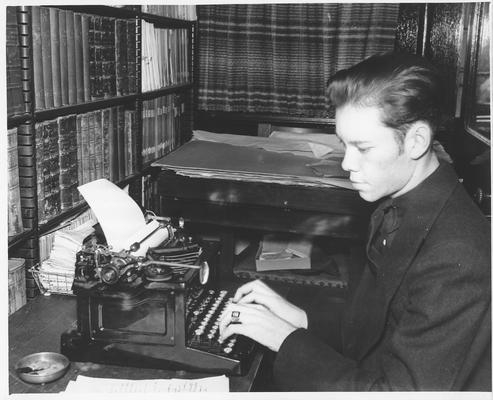 WPA worker typing old historical records
