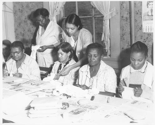 Six unskilled colored women report for work at the Training Work Center