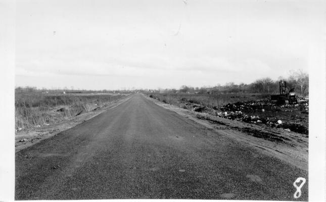 Blacktopped road leading to Danville Disposal Plant
