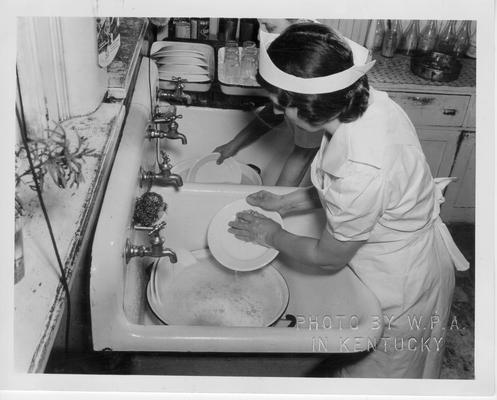 Washing dishes after a WPA school lunch has been served.  Abraham Lincoln School, Lexington, KY, March, 1940