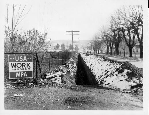 Water mains being installed by WPA at Warsaw.  Laying water mains Warsaw Gallatin Co