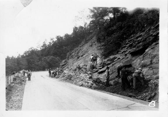 Quarrying stone along highway in Harlan County, 1940. When I passed there was no flag man