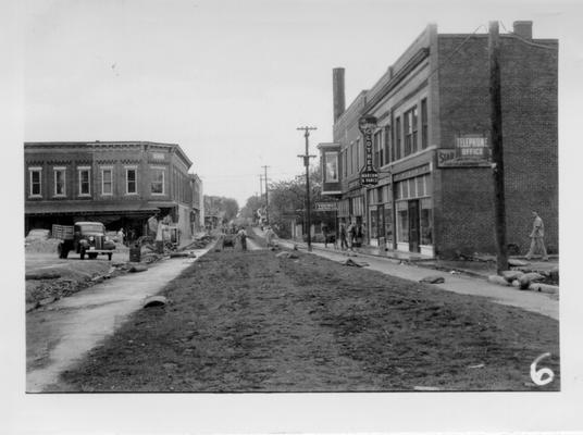 Horse Cave street constructed by WPA, 1941. Marcum and Vance Clothes, and Young's Department store signs in view