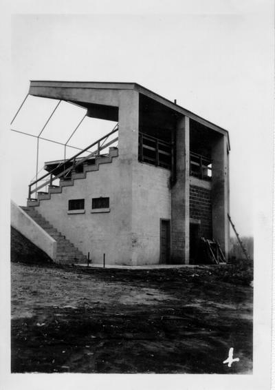 Concrete grandstand at Madisonville City Park. Note concrete arms holding roof